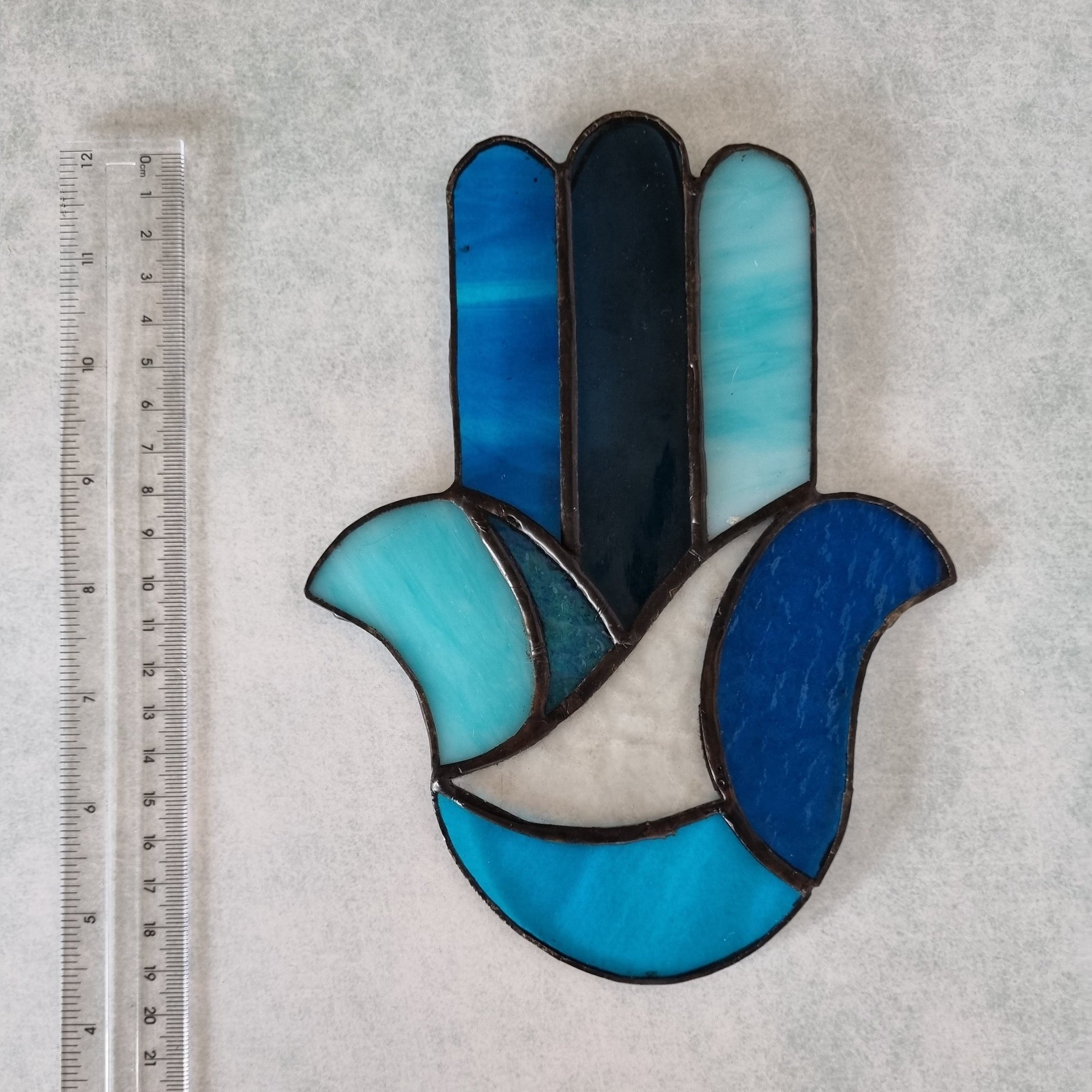 Blue stained glass Hamsa – hung on wall