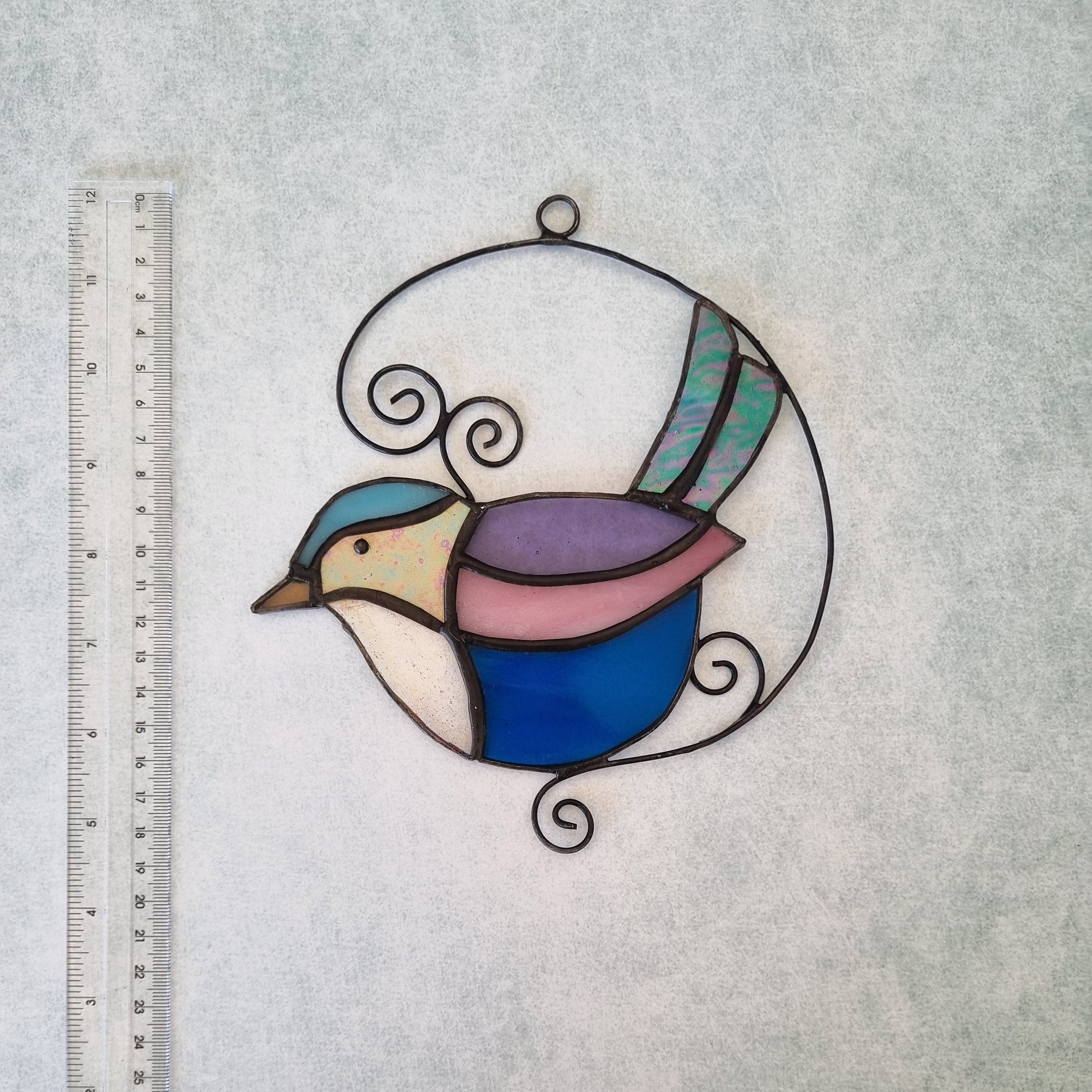 Colorful glass bird decoration – side view