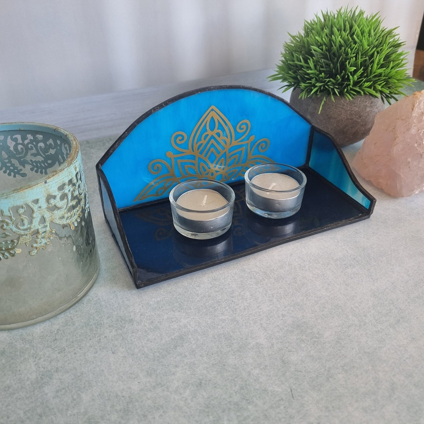 Glass stand for Shabbat candles with candles lit