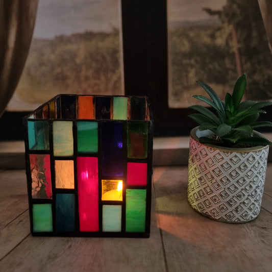 Handmade colored glass candle holder – warm glow with candle