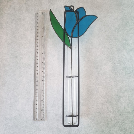 Handmade stained glass wall decoration with blue tulip – front view
