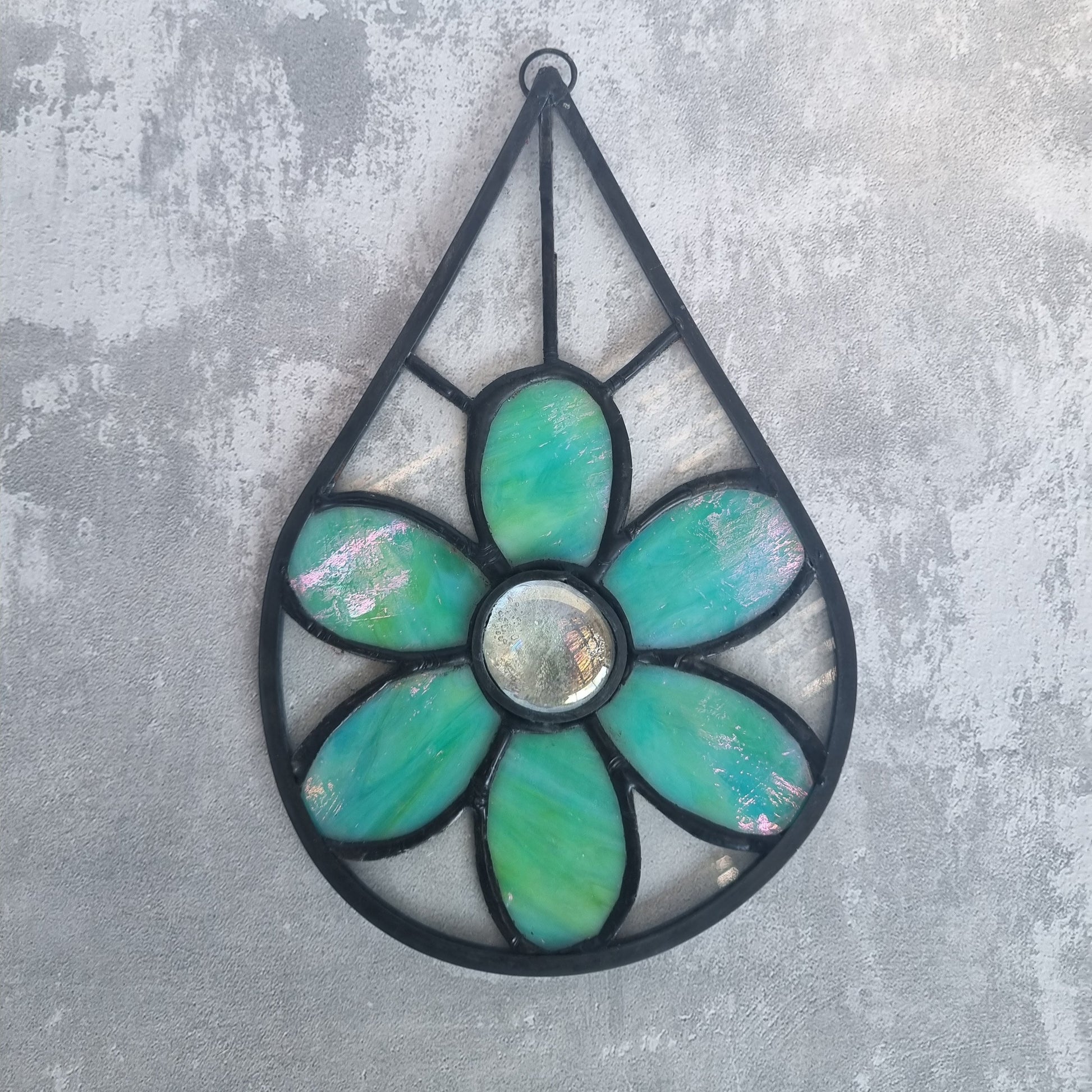 Handmade stained glass green flower suncatcher – hung on window