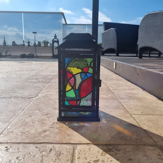 Handmade stained glass lantern – warm glow with candle lit
