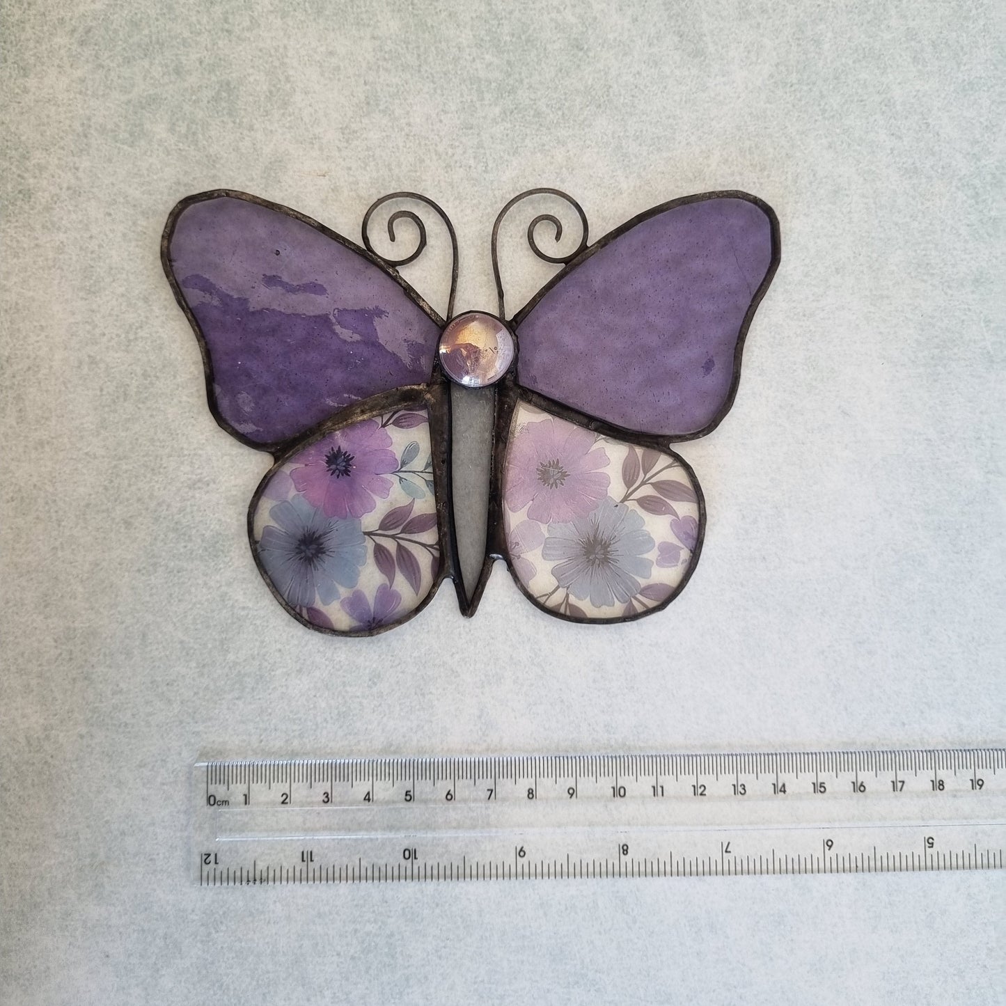 Purple stained glass butterfly – side view
