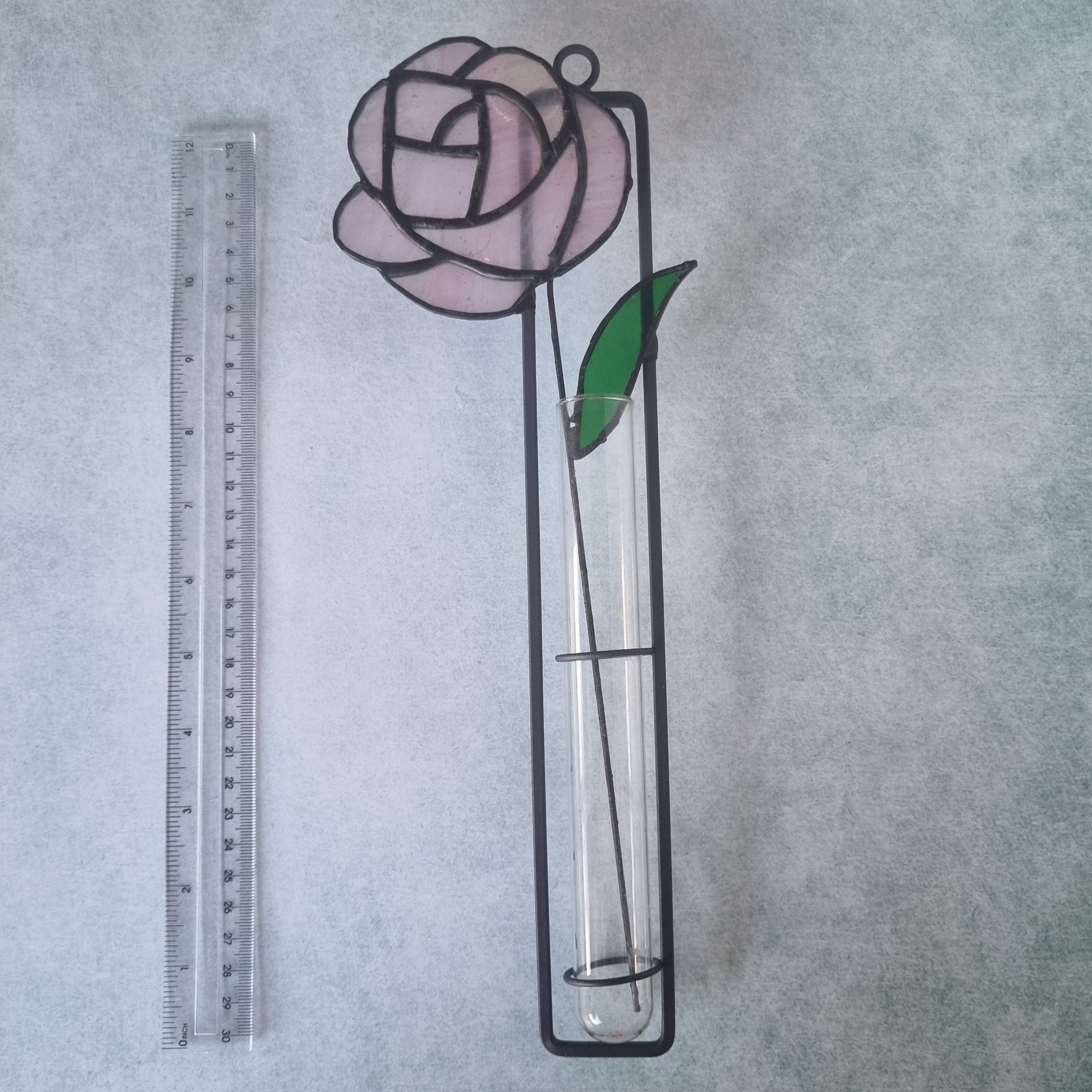 Stained glass pink rose wall decoration – close up detail